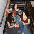 Bandier musical trio strikes harmony, friendship singing in SU’s stairwells