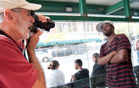 Through his lens: Retired SU professor clicks with individuals at bus stop in downtown Syracuse