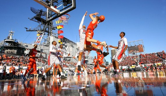 AGAINST THE WIND: SU overcomes weather to get win in historic season opener aboard USS Midway