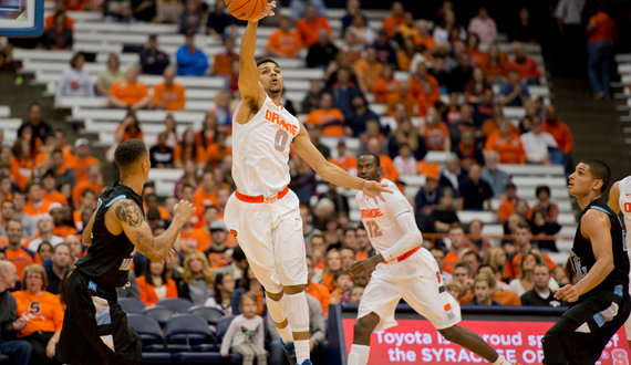 Gbinije struggles in 1st crack at point guard in Holy Family exhibition
