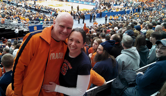 SU alumnus proposes to girlfriend on kiss cam during basketball game