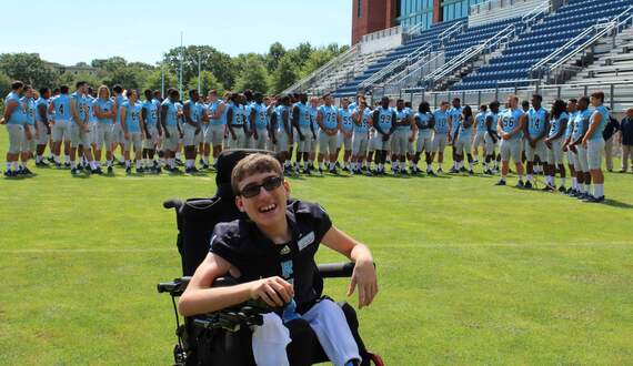 Rhode Island embraces Evan Huddon, 15-year-old with spinal defect, as member of team
