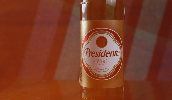 Presidente has tropical flavors, corny aftertaste