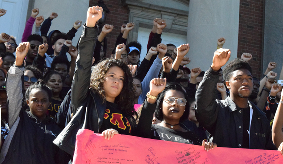 Syracuse University community members march against police violence toward black people