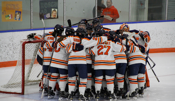 Syracuse ice hockey bonding and staying loose through weekly yoga sessions