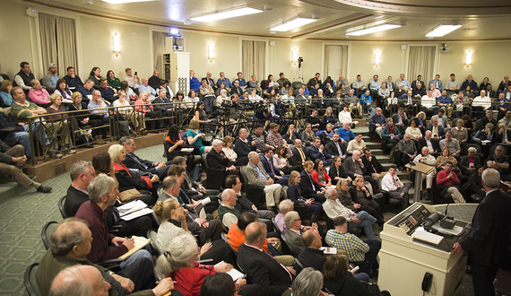 Audience members take stand on major issues at merger debate