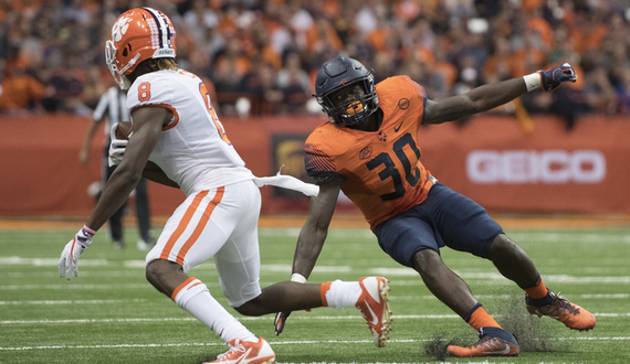 Our beat writers unanimously pick Clemson over Syracuse