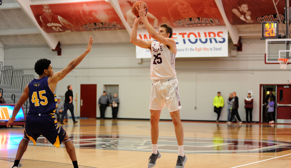 Rapolas Ivanauskas helps Colgate stretch the floor after transfer from Northwestern