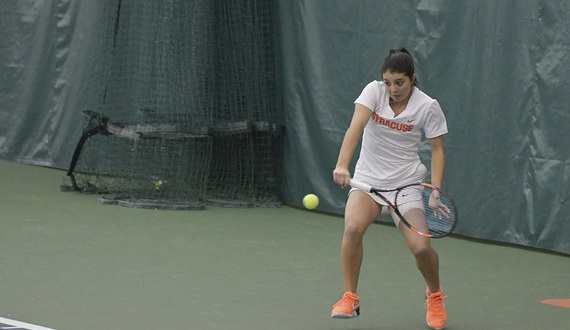 Behind Miranda Ramirez’s 1-handed backhand