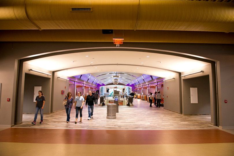 A hallway in the new expansion features a variety of vendors.