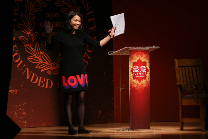 Ann Curry, NBC News’ national and international correspondent, waves to the crowd at the start of Monday morning's "Common Ground for Peace" panel in Goldstein Auditorium.