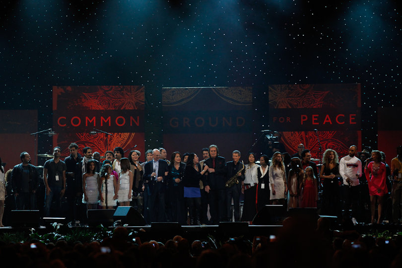 The entire cast of One World Concert artists performs John Lennon's "Imagine" together on stage.