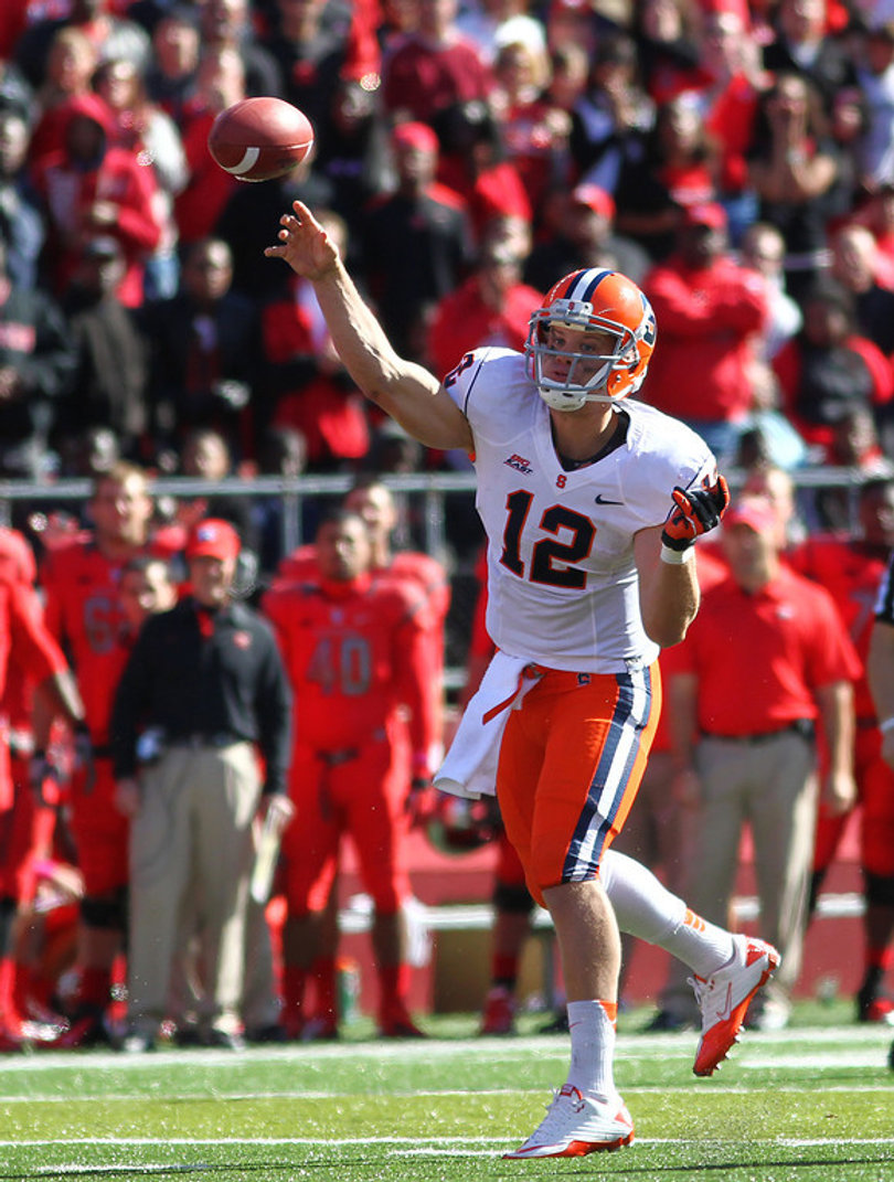 Quarterback Ryan Nassib fires a pass in Syracuse's 23-15 loss to Rutgers Saturday.