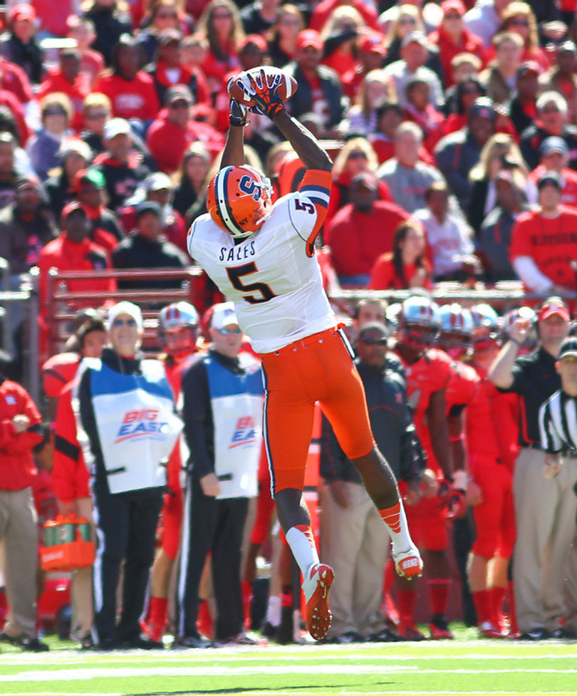 Syracuse wide receiver Marcus Sales makes a catch in the air.