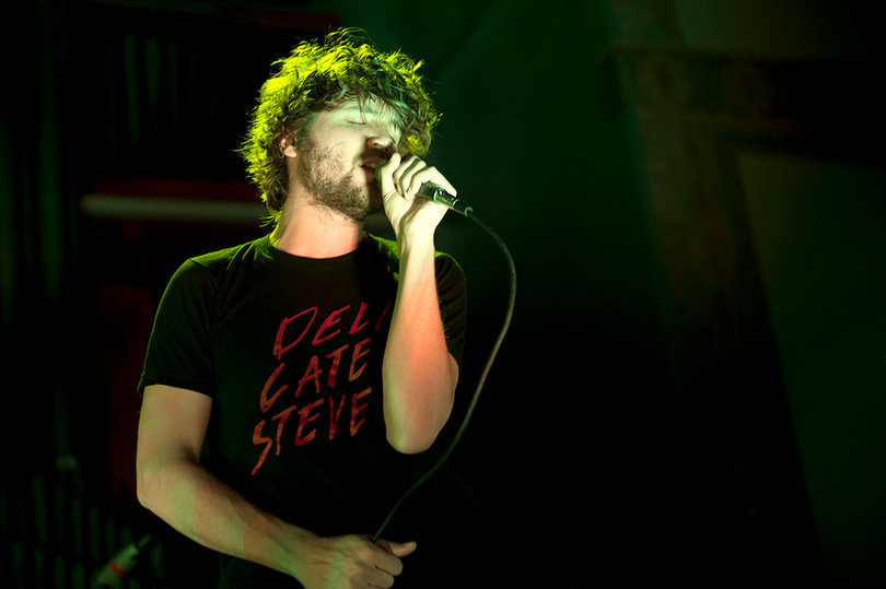 Wes Miles, front man of the indie band Ra Ra Riot, croons in front of an audience of 700 in Setnor Auditorium. Ra Ra Riot performed with the group Wired Strings.