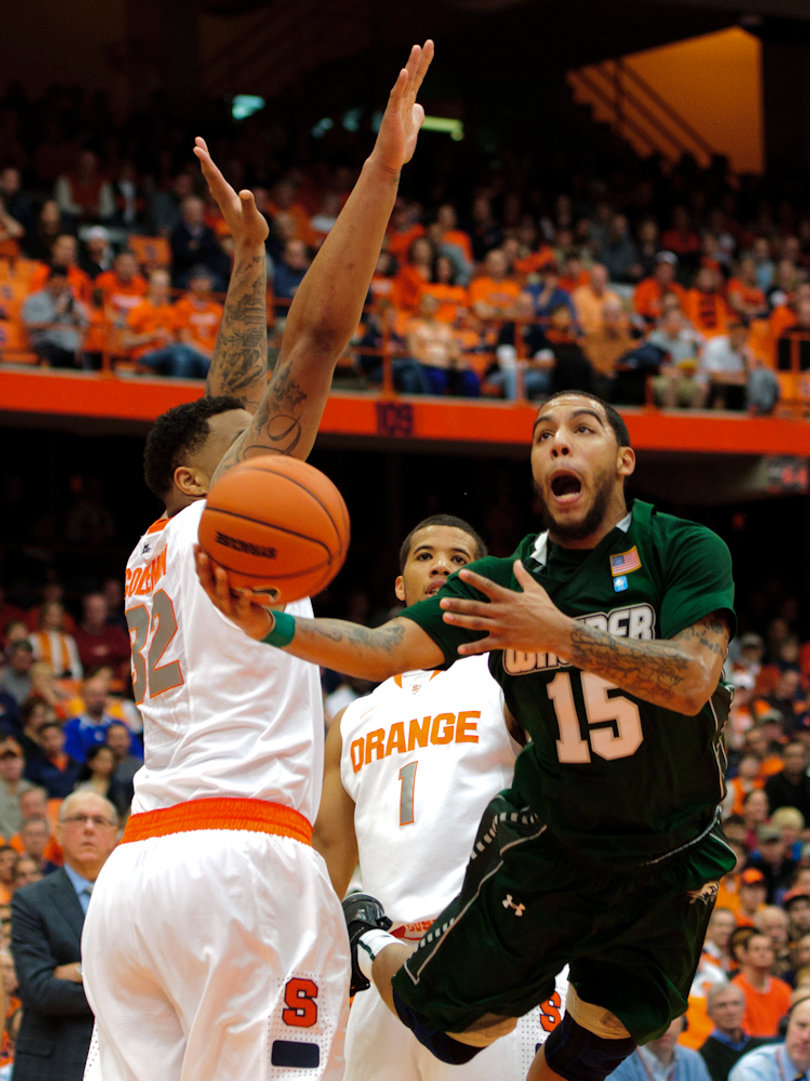 Wagner guard Kenneth Ortiz slices into the lane to attempt a layup.