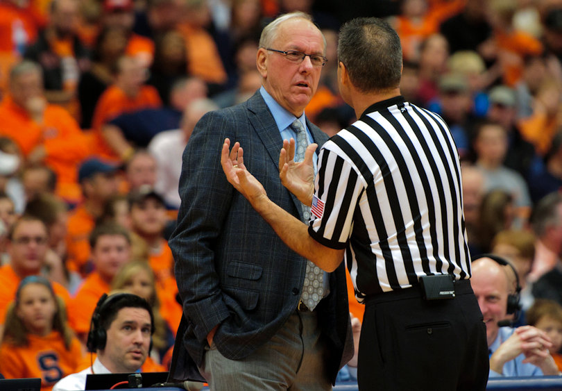 Syracuse head coach Jim Boeheim listens to an official.