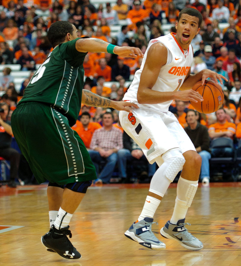 Syracuse guard Michael Carter-Williams protects the ball.