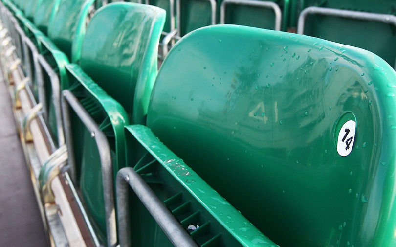 The reflection of the ship is seen in seat number 14 in the bleachers aboard the USS Midway Museum on Nov. 8, 2012, before the Battle on the Midway game between the Syracuse Orange and the San Diego State Aztecs scheduled for Sunday.