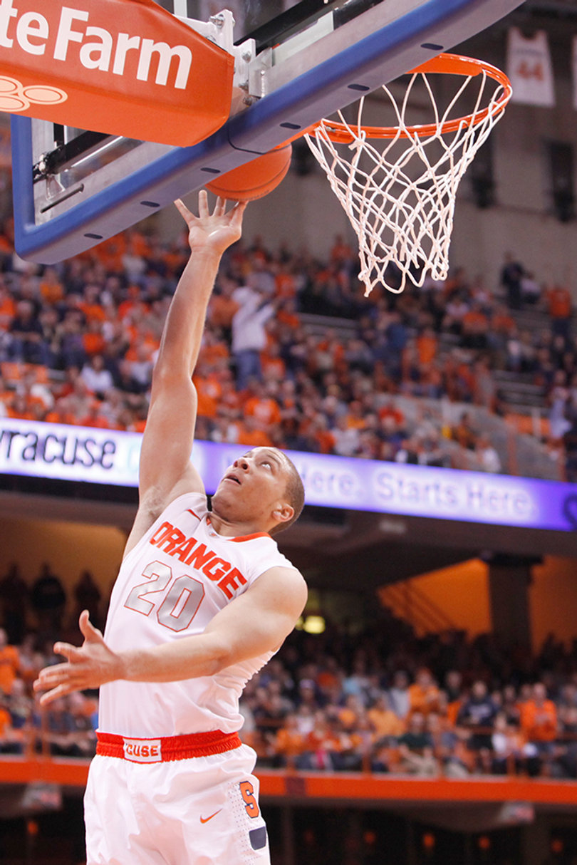 Brandon Triche goes up for an open layup in the second half. Triche scored 12 points and notched 5 assists in SU's victory over Eastern Michigan on Monday night.