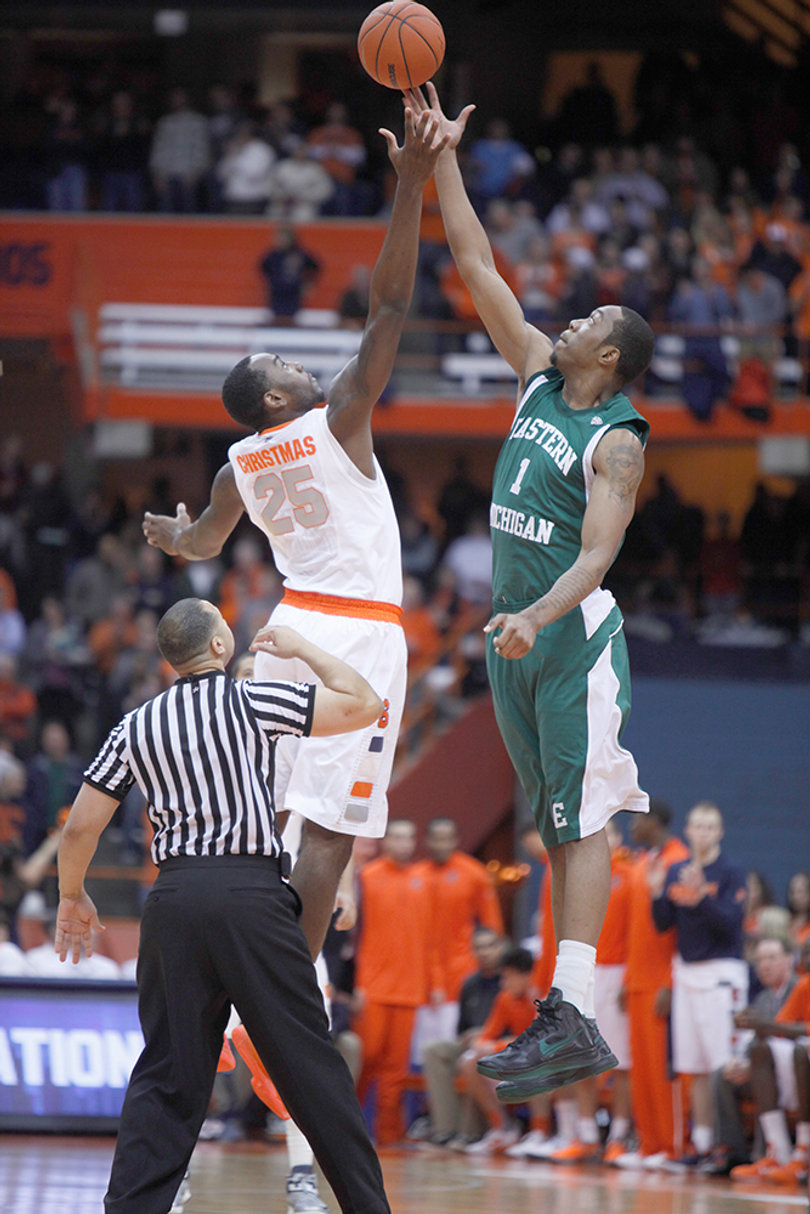 Rakeem Christmas goes up for the opening tip against Eastern Michigan.