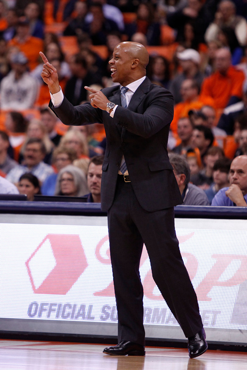 Eastern Michigan head coach and former Syracuse assistant coach Rob Murphy calls out instructions to his team.