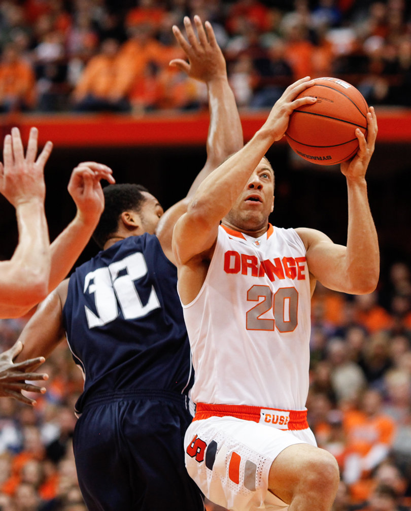 Syracuse guard Brandon Triche attempts a layup in the Orange's win over Monmouth on Saturday. Triche scored 18 points and had eight assists.