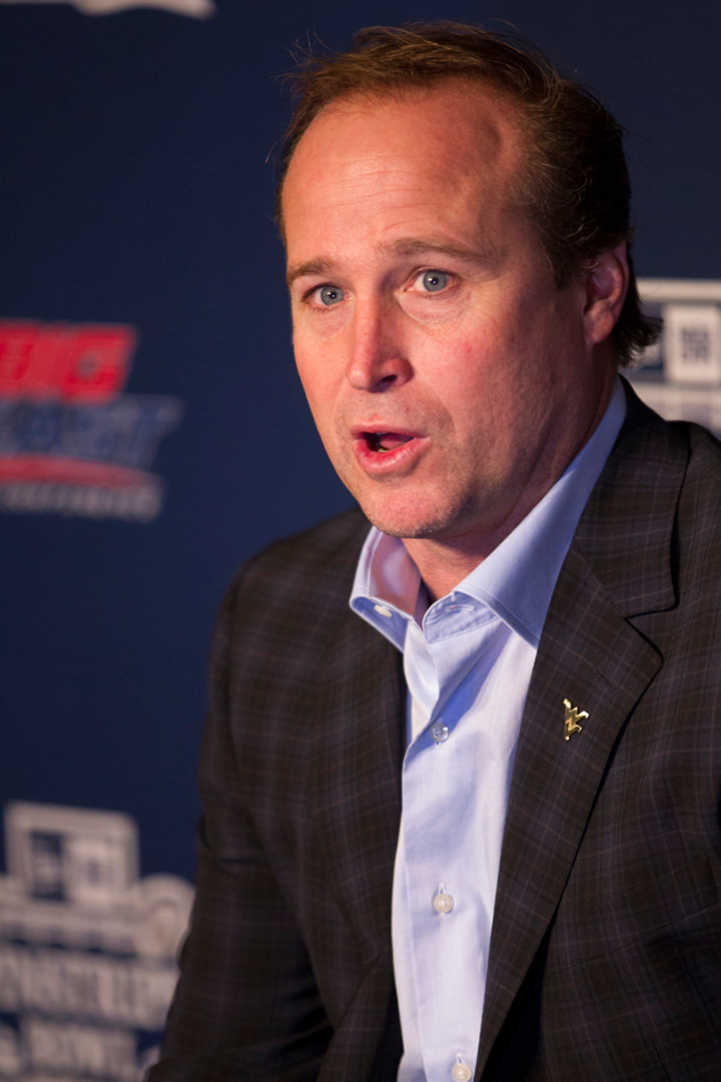 Dana Holgorsen speaks on Wednesday at a Pinstripe Bowl news conference. West Virginia finished the regular season with a 7-5 record in its first year as a member of the Big 12.