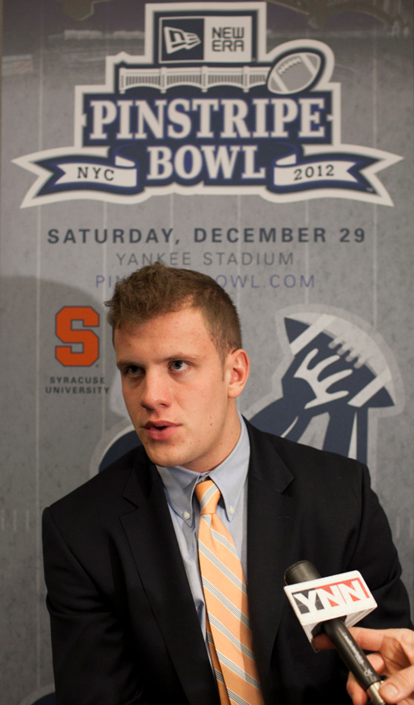 Syracuse quarterback Ryan Nassib speaks to reporters during the Pinstripe Bowl media day at Yankee Stadium on Wednesday.