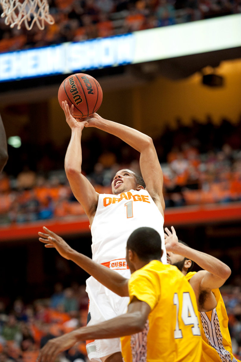 Michael Carter-Williams attempts a baseline shot from in close.