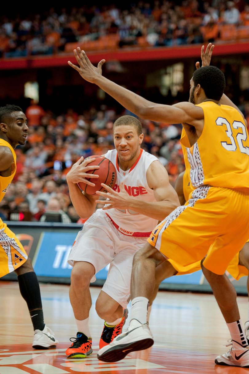 Brandon Triche fights through three Alcorn State defenders on his way to the basket.
