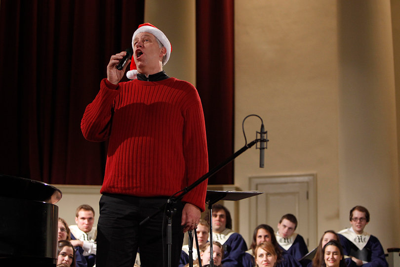 Bruce Paulsen entertains the audience with the song "You're a Mean One Mr. Grinch" Sunday night. 
