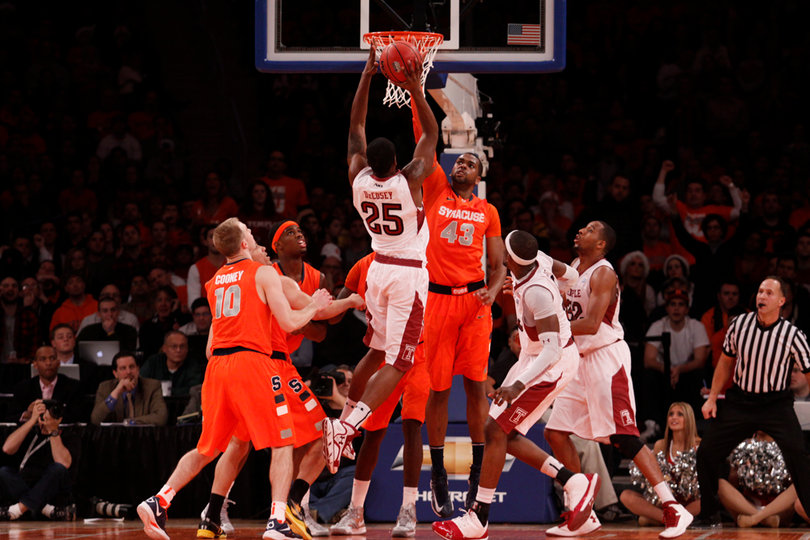 James Southerland tries to block Quenton DeCosey's shot. Southerland finished the game with zero blocks.