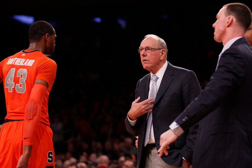 Jim Boeheim speaks with Southerland during a pause in play Saturday afternoon.