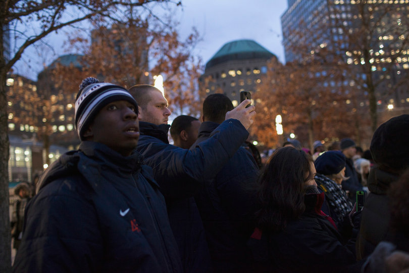 Syracuse running back Jerome Smith (left) observes the 9/11 Memorial Thursday.