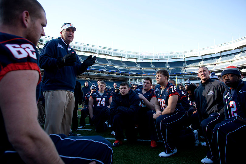 Head coach Doug Marrone speaks to the Syracuse football team and area youths attending a "chalk talk" Friday at Yankee Stadium.