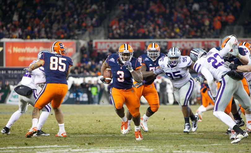 Delone Carter finds a hole to run through the Kansas State defense. Carter ran for a career-high 198 yards and two touchdowns in the Orange's 36-34 win.
