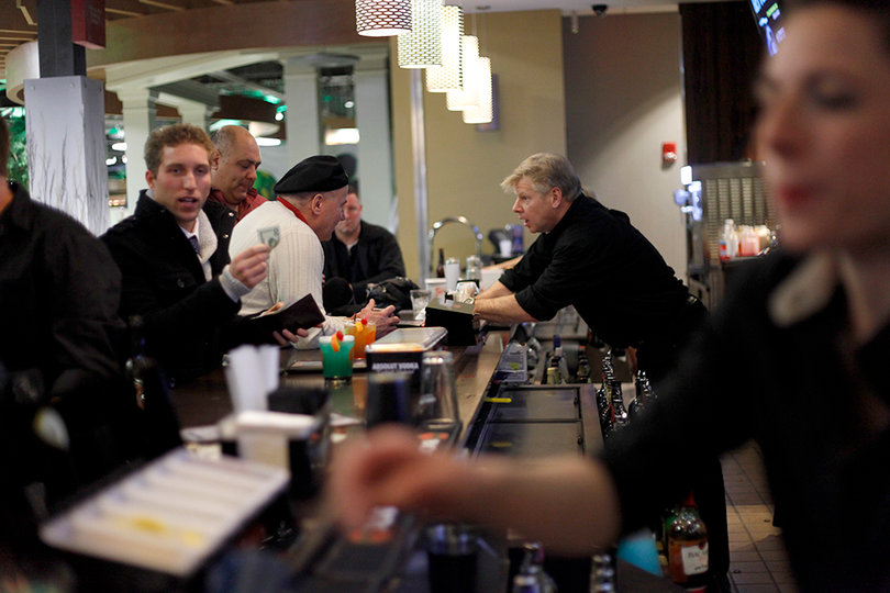 Customers at the bar of the Funny Bone Comedy Club and Restaurant. The club has a liquor license and therefore does not allow anyone under 21 in the venue.