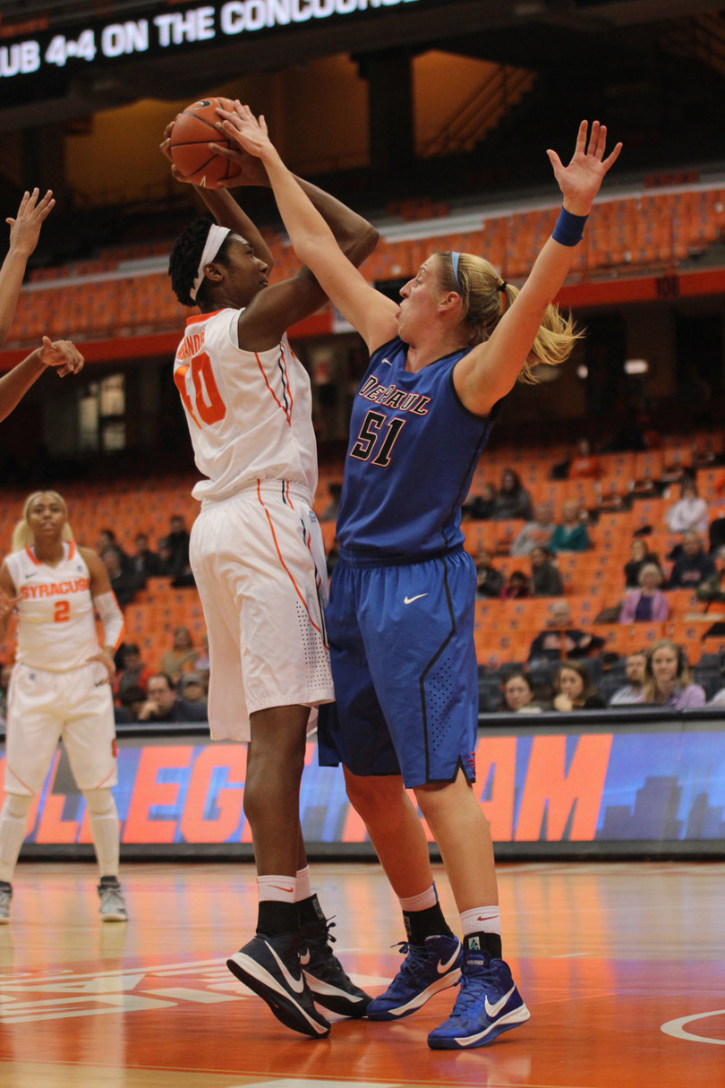 Kayla Alexander shoots a jumper over DePaul forward Katherine Harry.