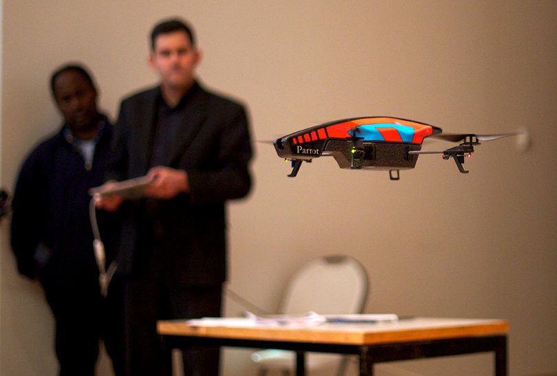 Dan Pacheco, a professor in the S.I. Newhouse School of Public Communications, shows off a drone owned by SU that can take photos.