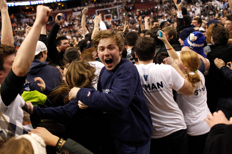 Villanova fans celebrate on the court after storming it following the Wildcats' second victory over a top-five team this week.