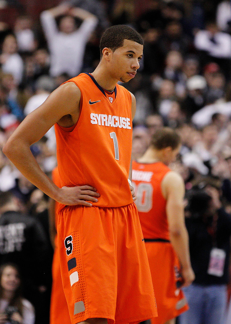 Michael Carter-Williams stands with his hands on his hips during the Orange's overtime loss to Villanova.