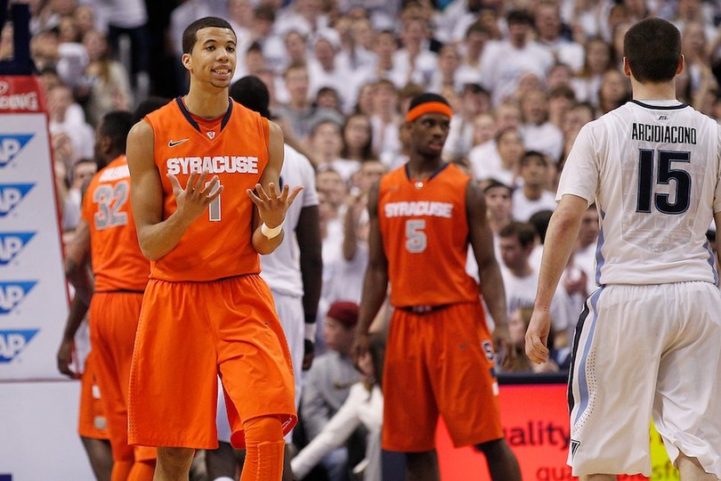Syracuse guard Michael Carter-Williams (1) reacts to a foul call in the second half. 