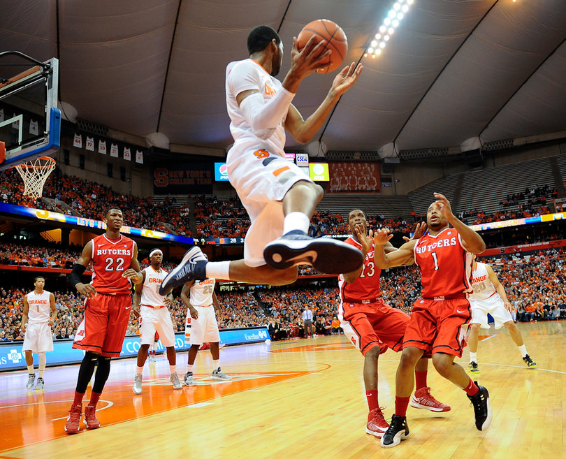 James Southerland keeps the ball from going out of bounds.