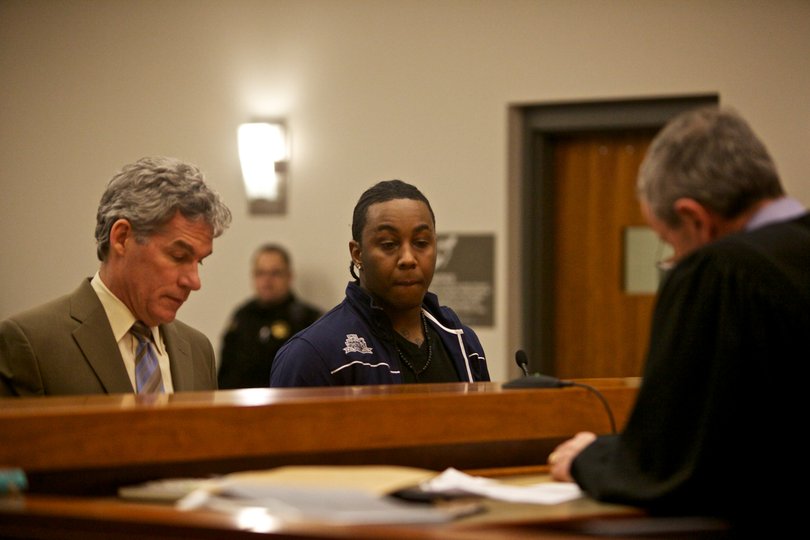 Steve Rene appears in court Wednesday with his attorney, Christopher Burke.