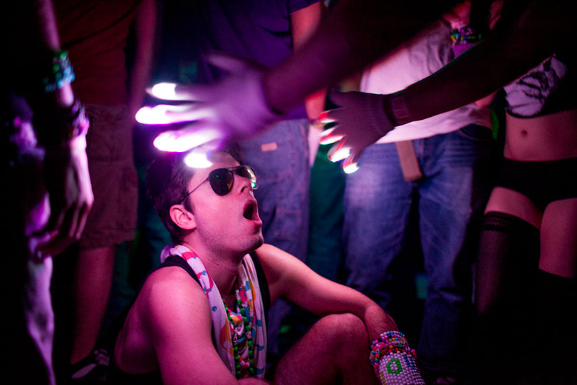 Glovers, popular crowd pleasers, scattered the dance floor at the Krewella concert. Glovers dance with gloves that have colored LED lights at the finger tips.