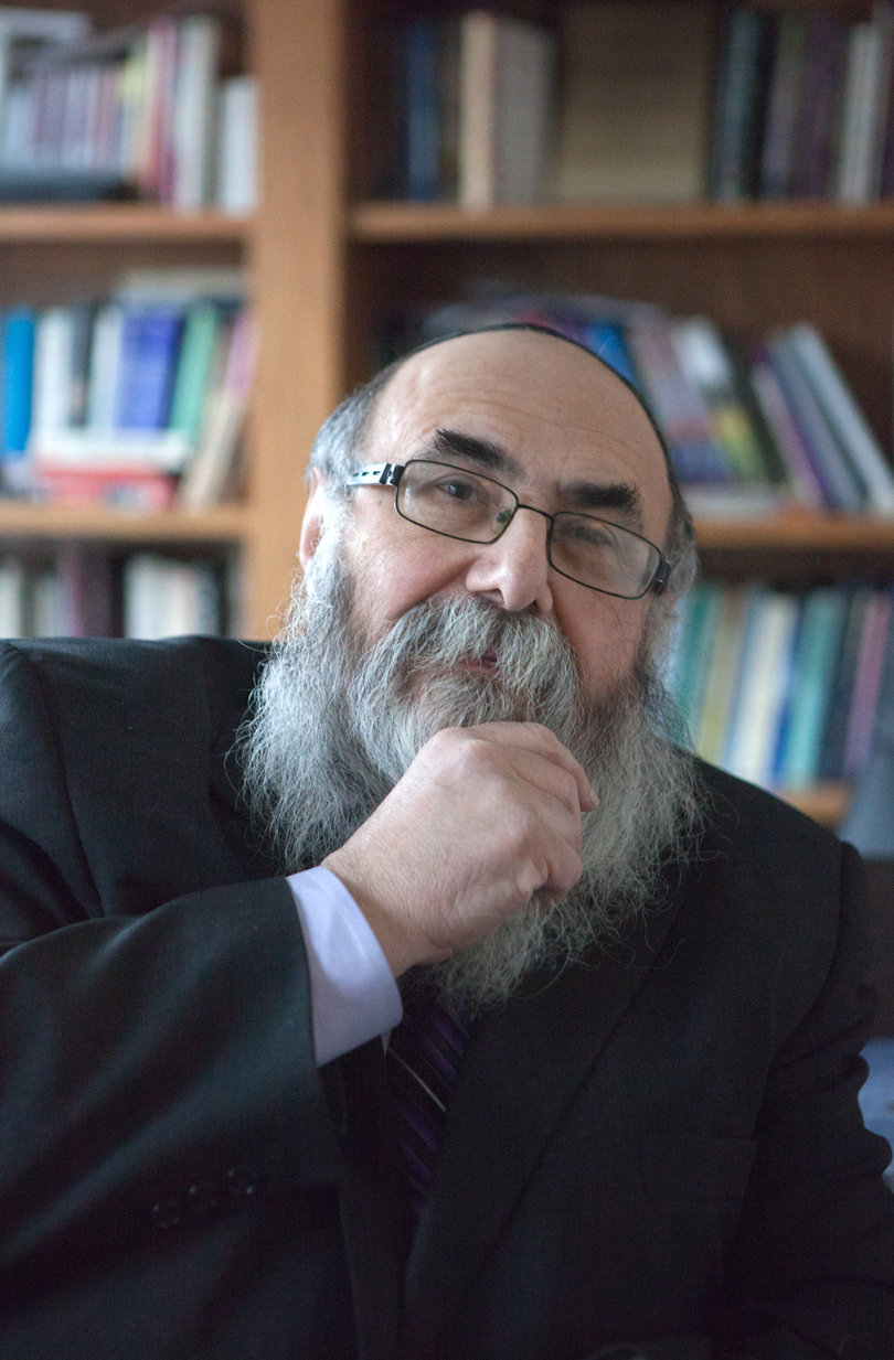Rabbi Rapoport sits in the library at the Chabad House, located on Ostrom Avenue. 