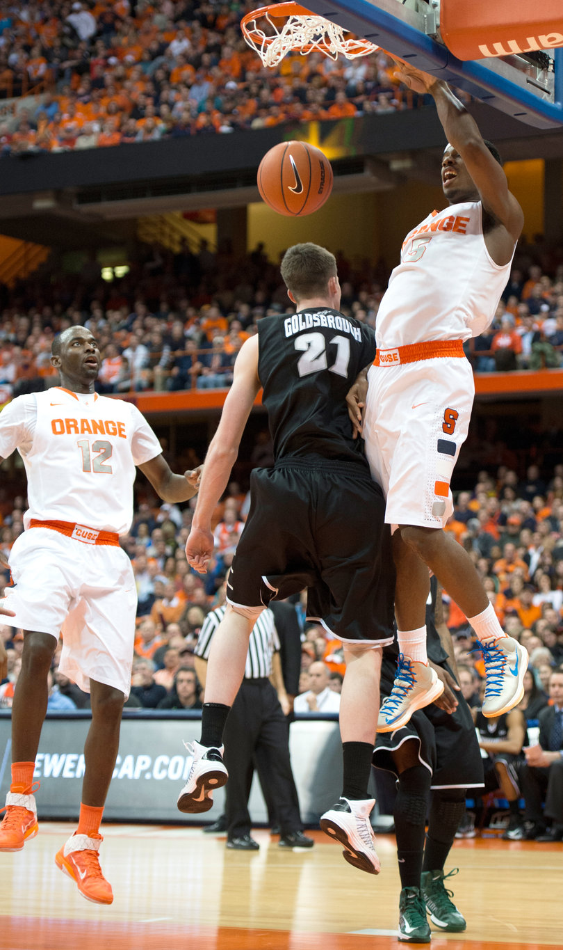 C.J. Fair dunks over Lee Goldsbrough Wednesday night. Fair scored 20 points and snagged 10 rebounds in the win.