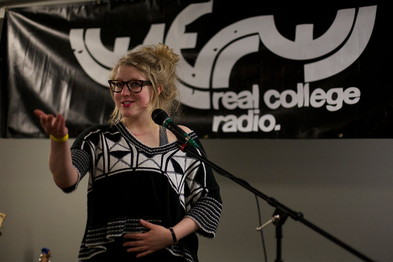 Jeanette Wall of WERW got on stage during the 25th anniversary concert of the radio station. 
