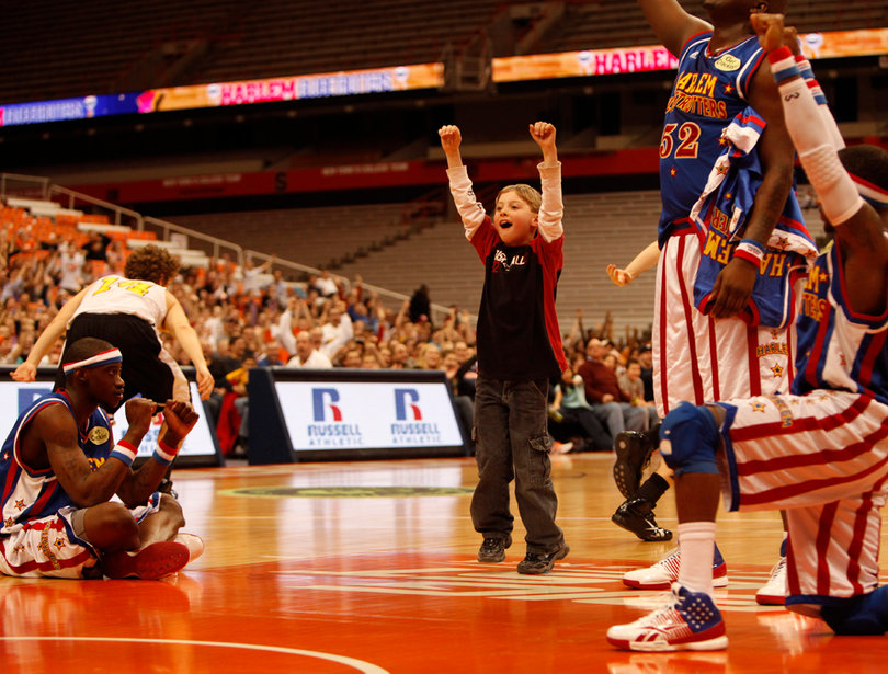 And finally, on his 11th attempt, their prayers were answered, as the fan's shot rolled around the rim and through the hoop.